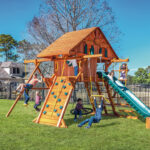 5.8 Jaguar Playcenter w/ Wood Roof, Treehouse Panels and Green Scoop Slide